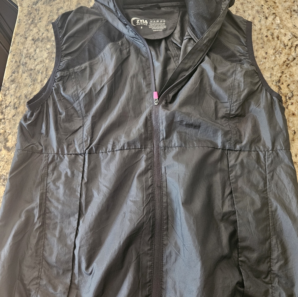 Black Sleeveless Hooded Vest By ZYIA. Worn Once. Very Light Weight